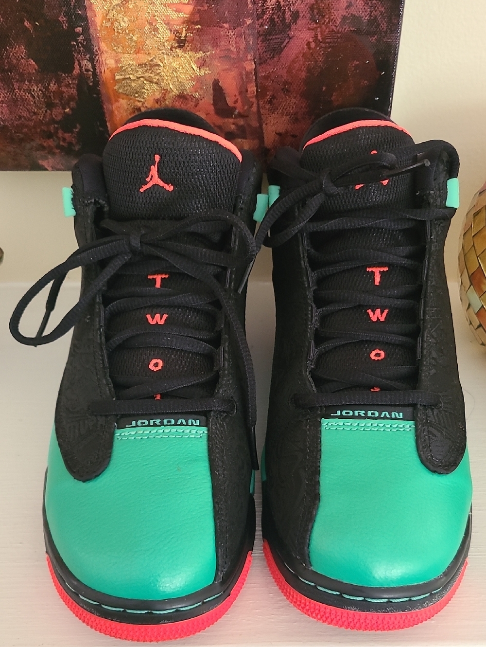 Jordan Dub Zero Black and Teal Basketball Sneakers with Coral Accents